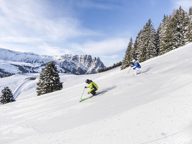Skiing holiday on the Seiser Alm with panoramic view of the Dolomites