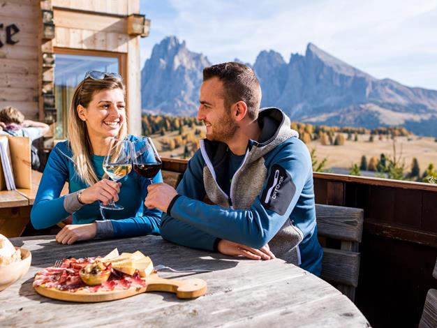 Pleasure and culinary in one of our huts on the Seiser Alm with breathtaking scenery